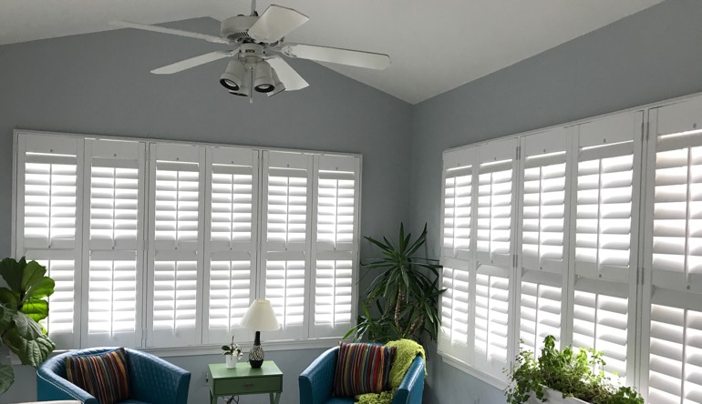 Cleveland sunroom with fan and shutters